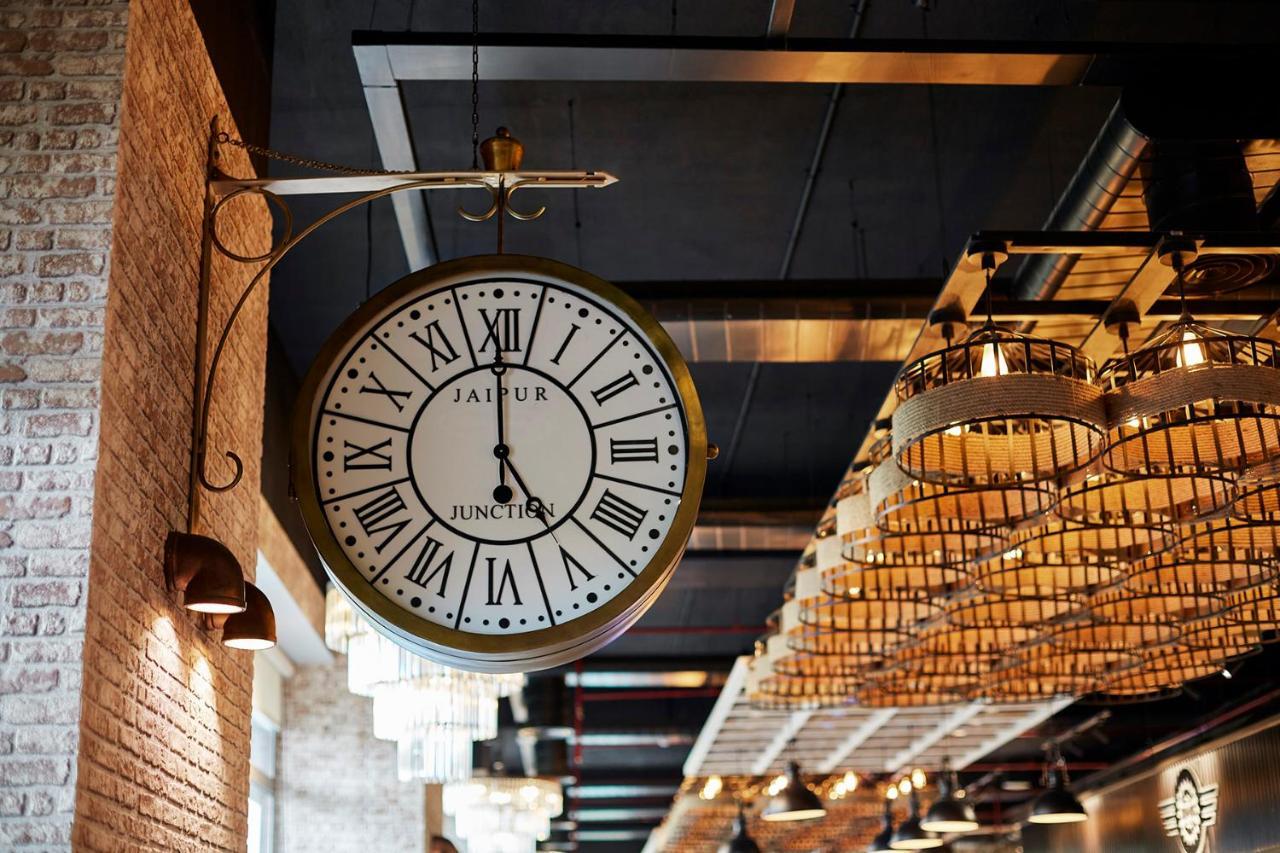 Hyatt Place Jaipur Malviya Nagar Екстериор снимка The clock at the entrance of the station
